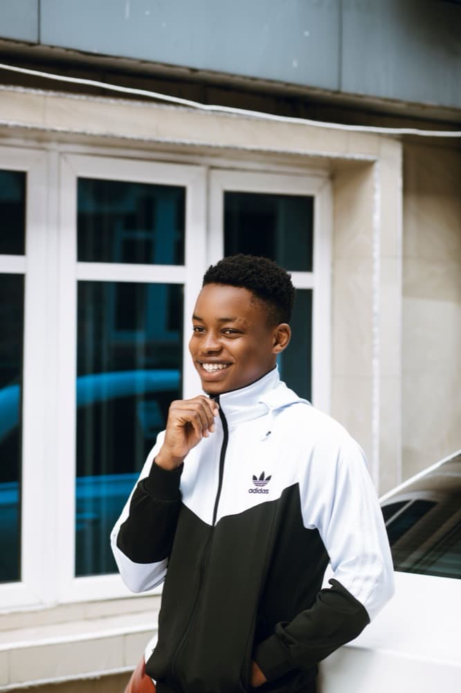 Young man smiling in the city
